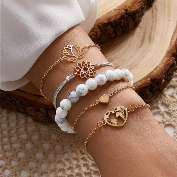 Urban Outfitters Jewelry - urban 5pc heart and lotus bracelet set